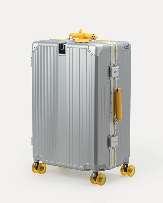 TravelCore Aluminum Spinner Suitcase | Silver Yellow